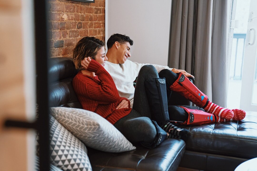 couple talking on couch