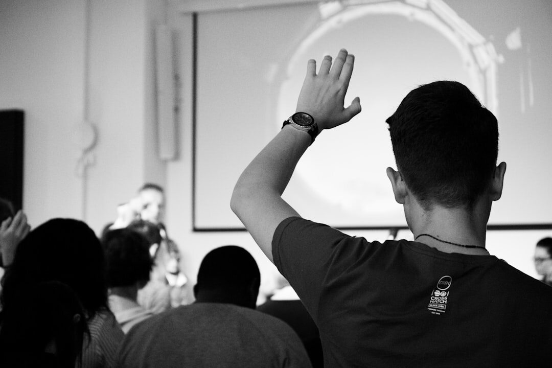 man presenting to audience